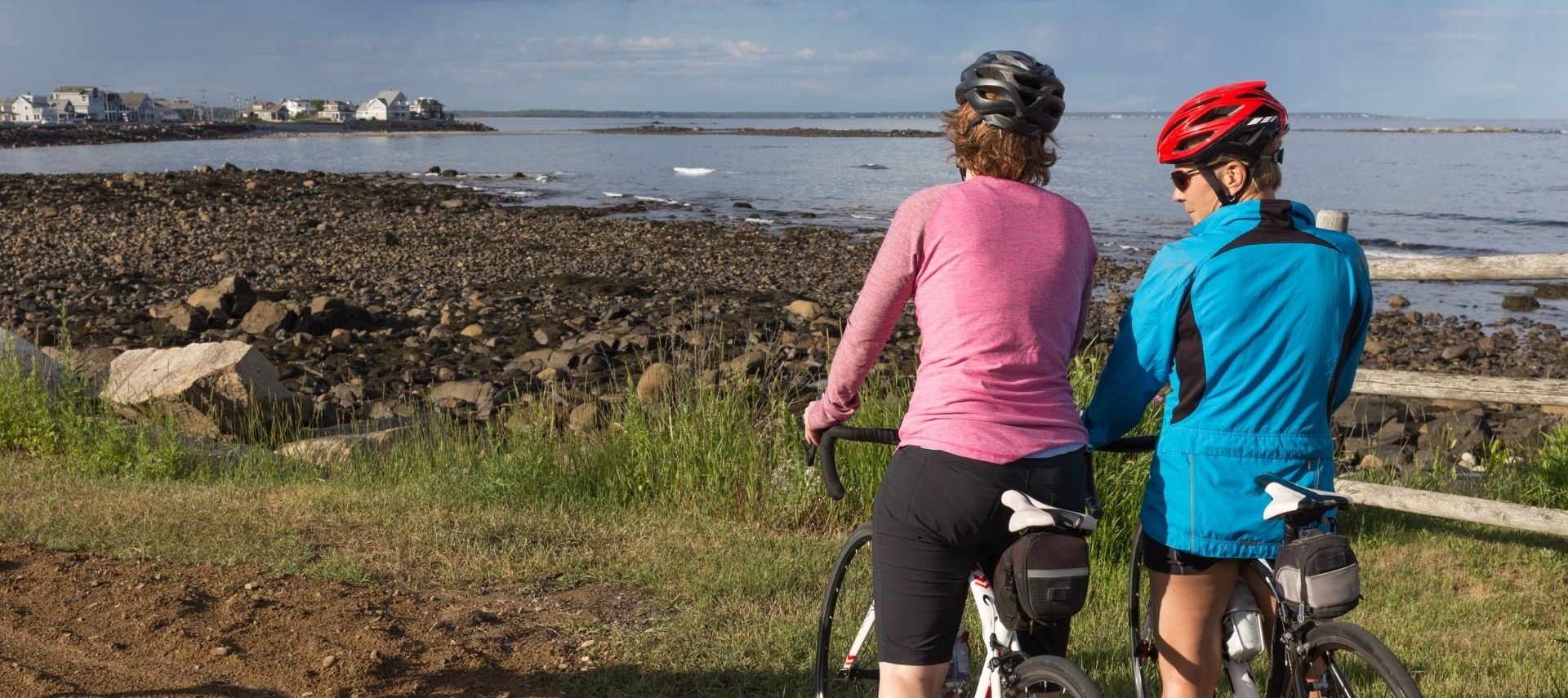 Two bikers stopped to take in the coastline view