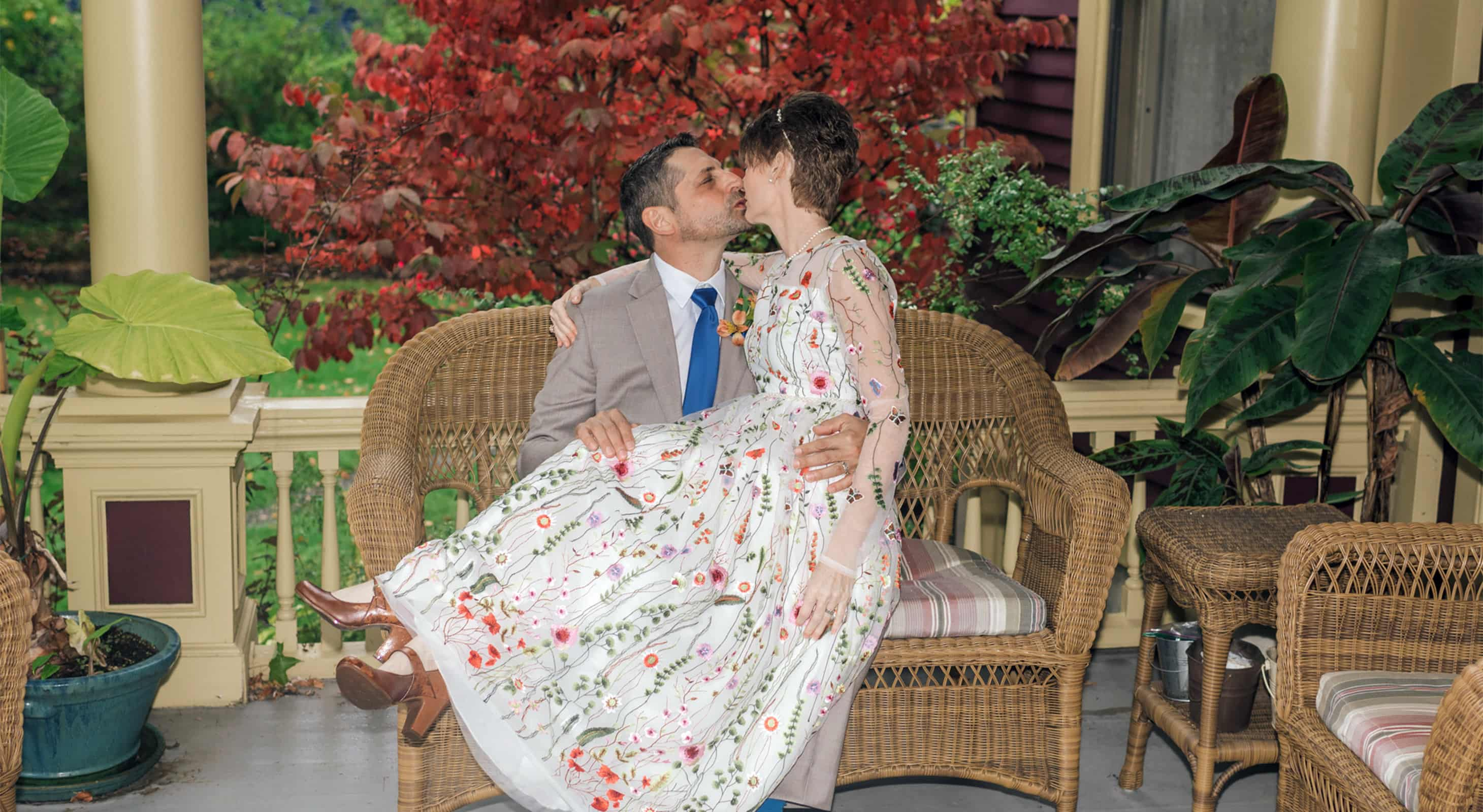 Elopement couple kissing on our front porch