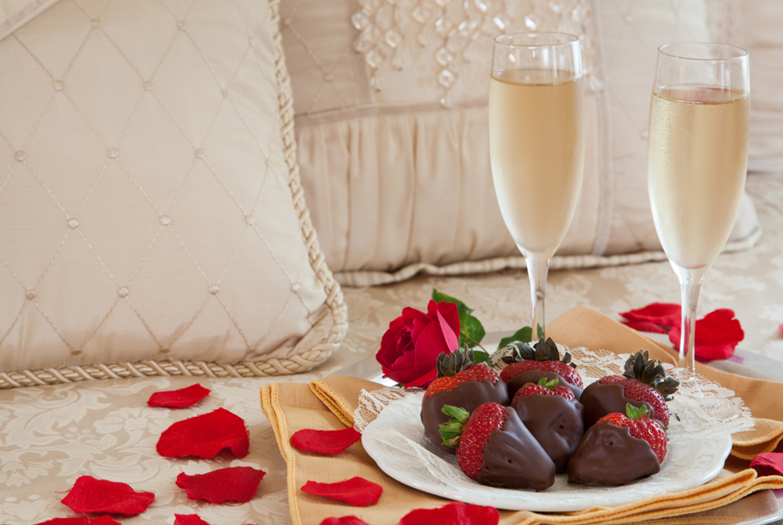 An Anniversary Package with champagne and chocolate covered strawberries