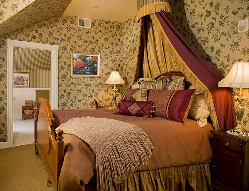 Lavish bed with canopy in Room 11