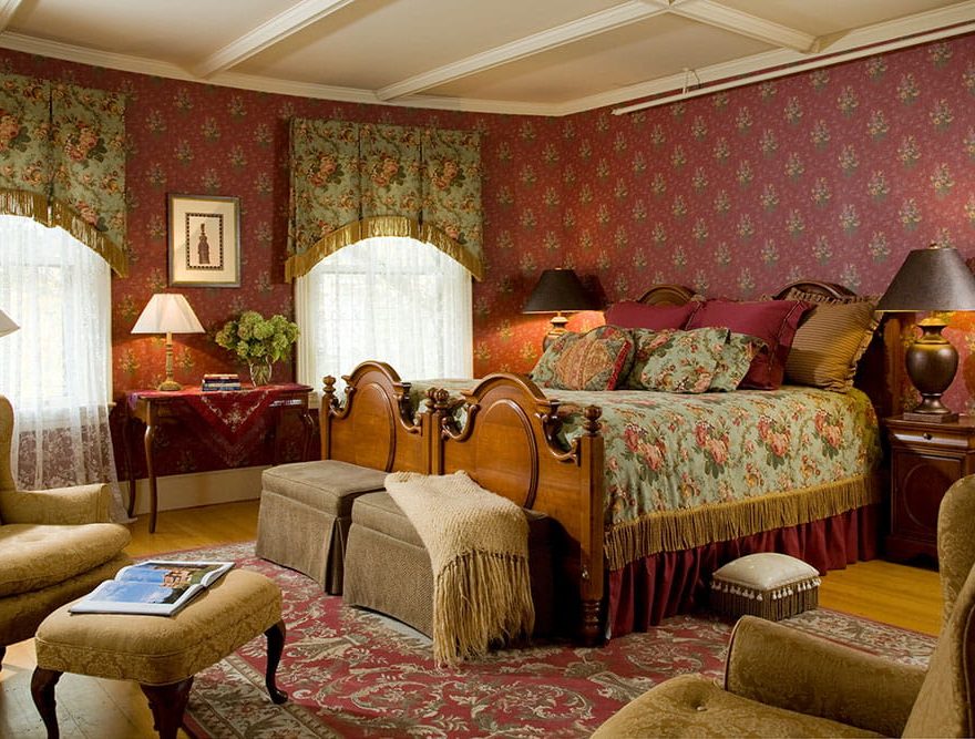 Ornate wooden bed in Room 2