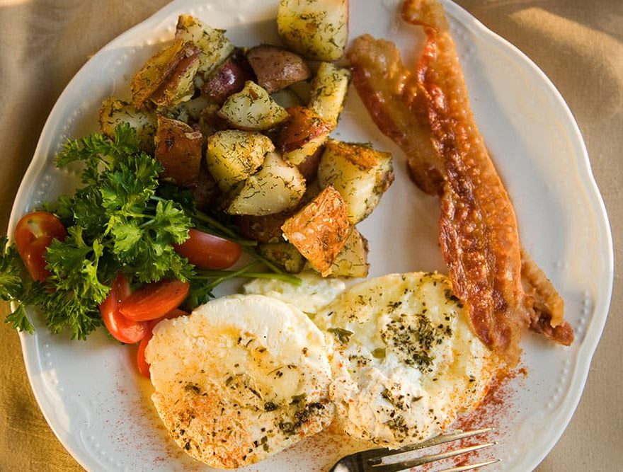 Breakfast Plate with potatoes, eggs, and Bacon