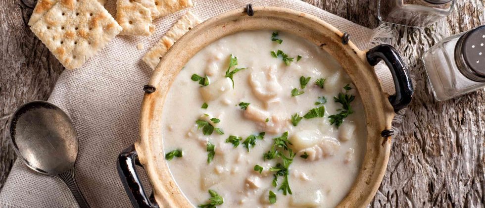 Bowl of New England Clam Chowder with Crackers