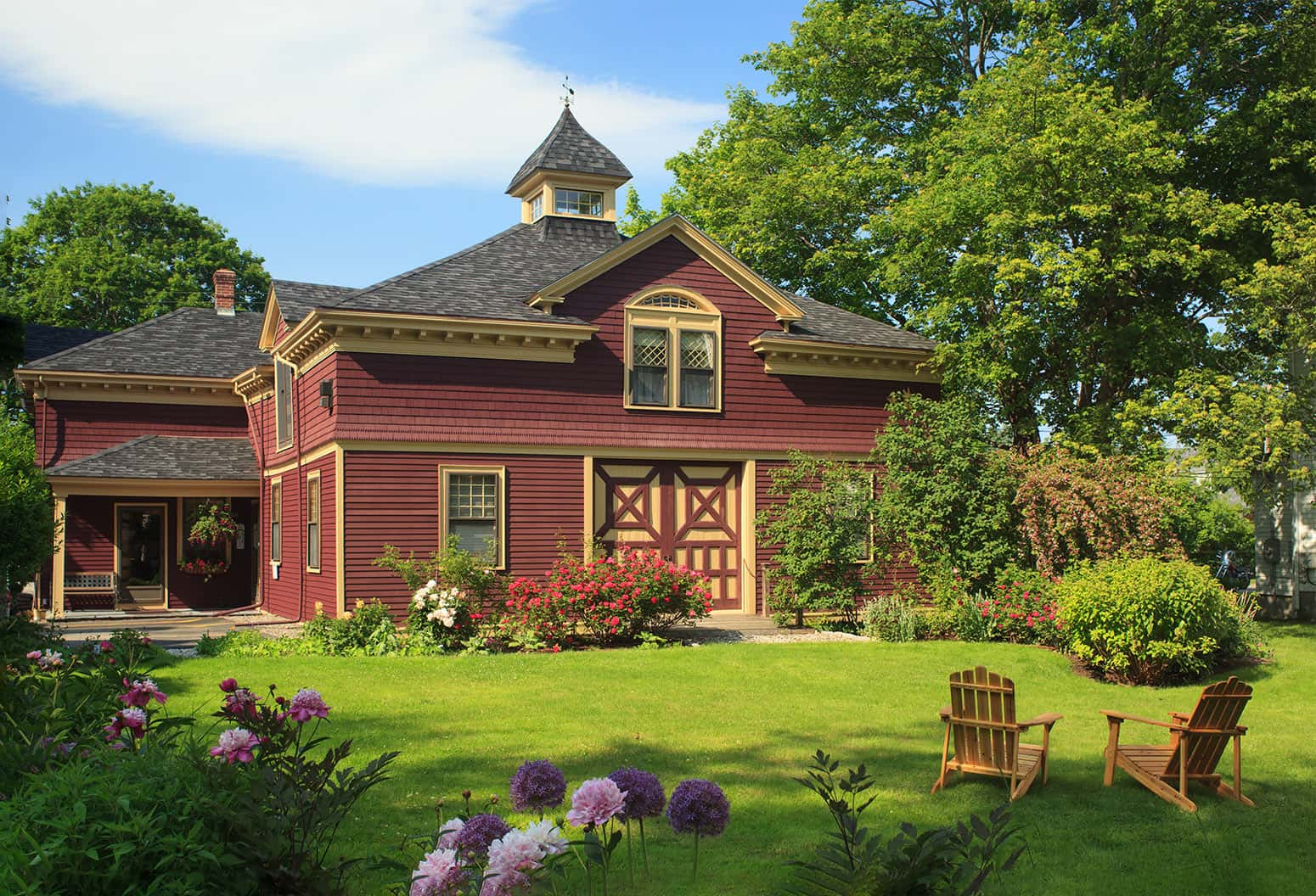 Our Gardens with two adirondack chairs