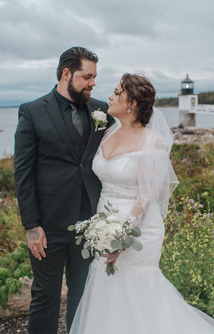 Bride and Groom in front of lighthouse