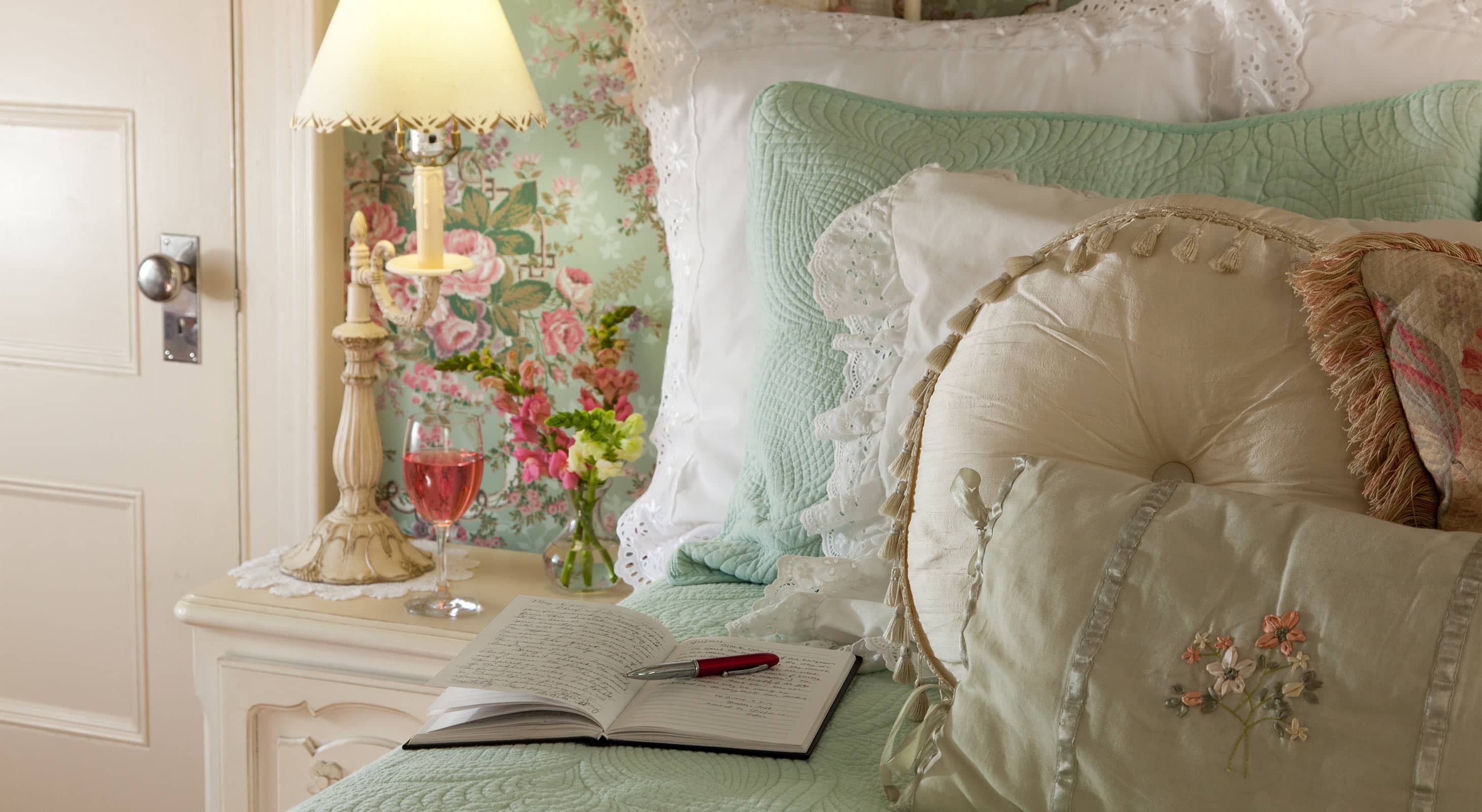 Journal in Room 4 and glass of Rose