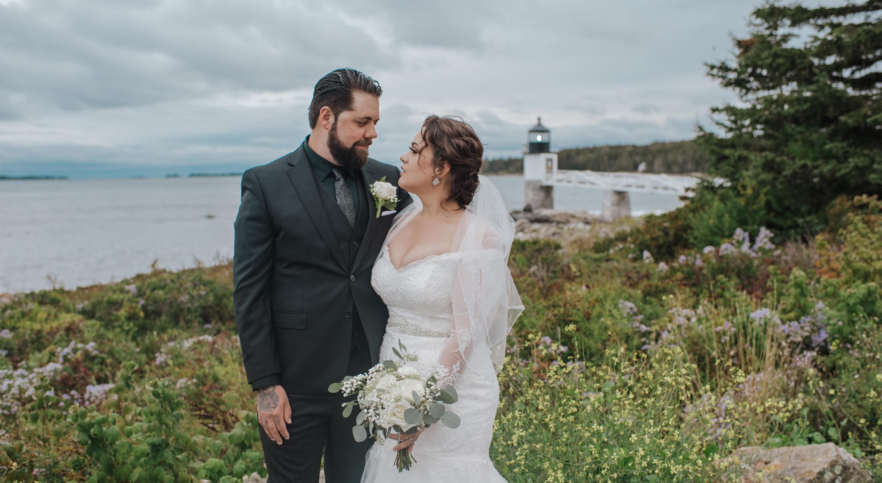 Bride and Groom in front of lighthouse