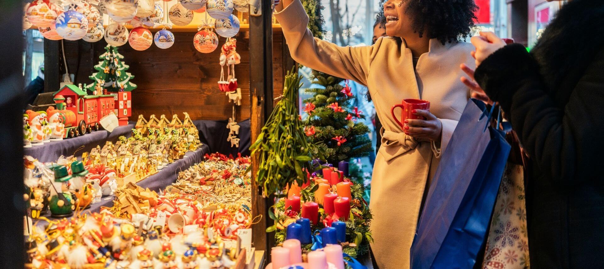 Two ladies shopping at Christmas market