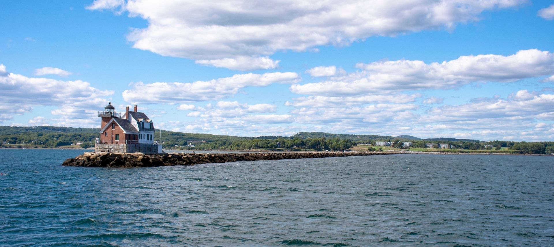 Breakwater Lighthouse on the tip of a narrow peninsula in Penobsoct Bay in Rockland Maine
