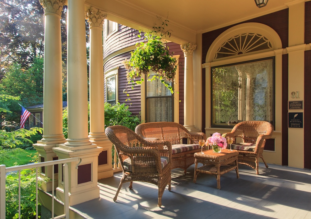 Front porch with wine at the Berry Manor Inn, the leading Maine Bed and Breakfast on Penobscot Bay