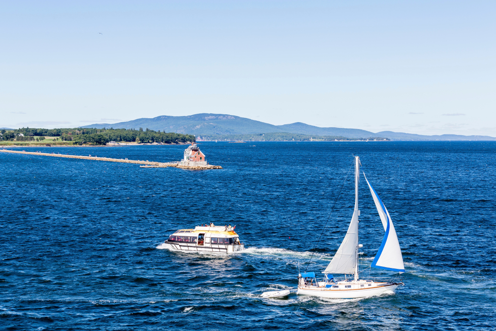 Setting sail out of the Rockland Harbor on Penobscot Bay, near the Rockland Lighthouse